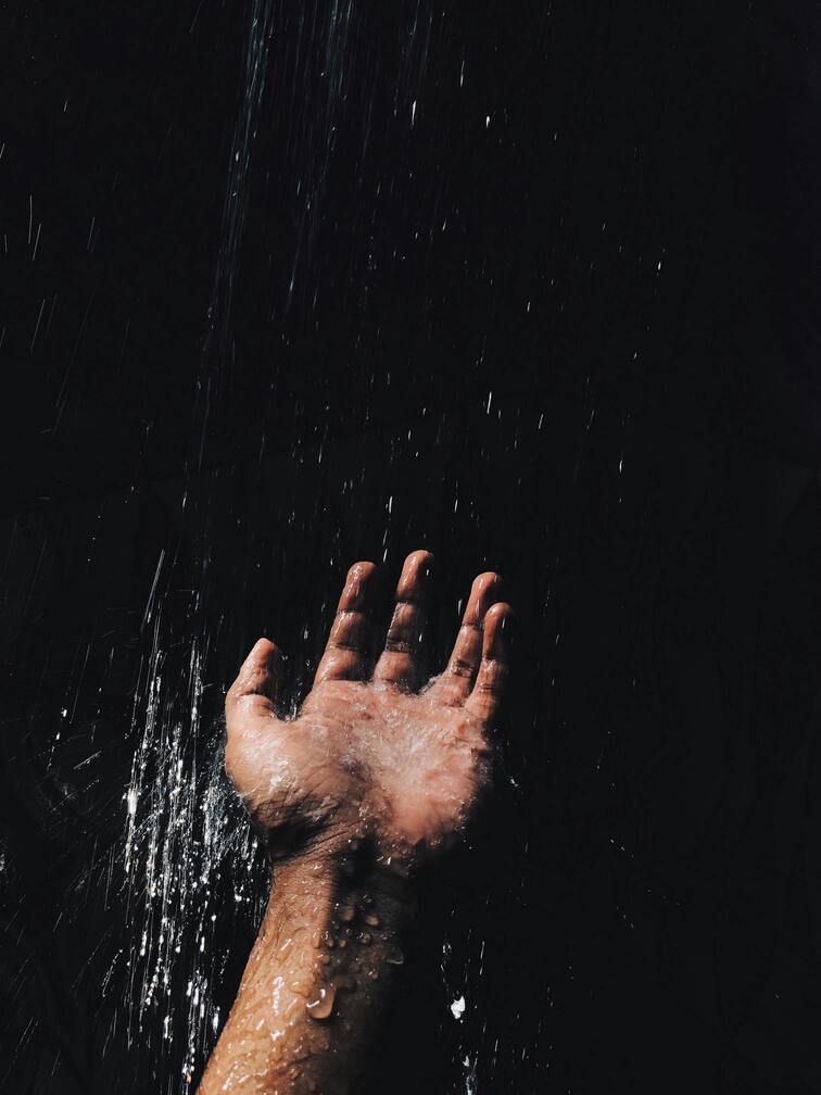 Uplifted Hand in the Rain